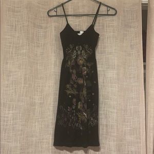Black spaghetti strap dress with floral detailing